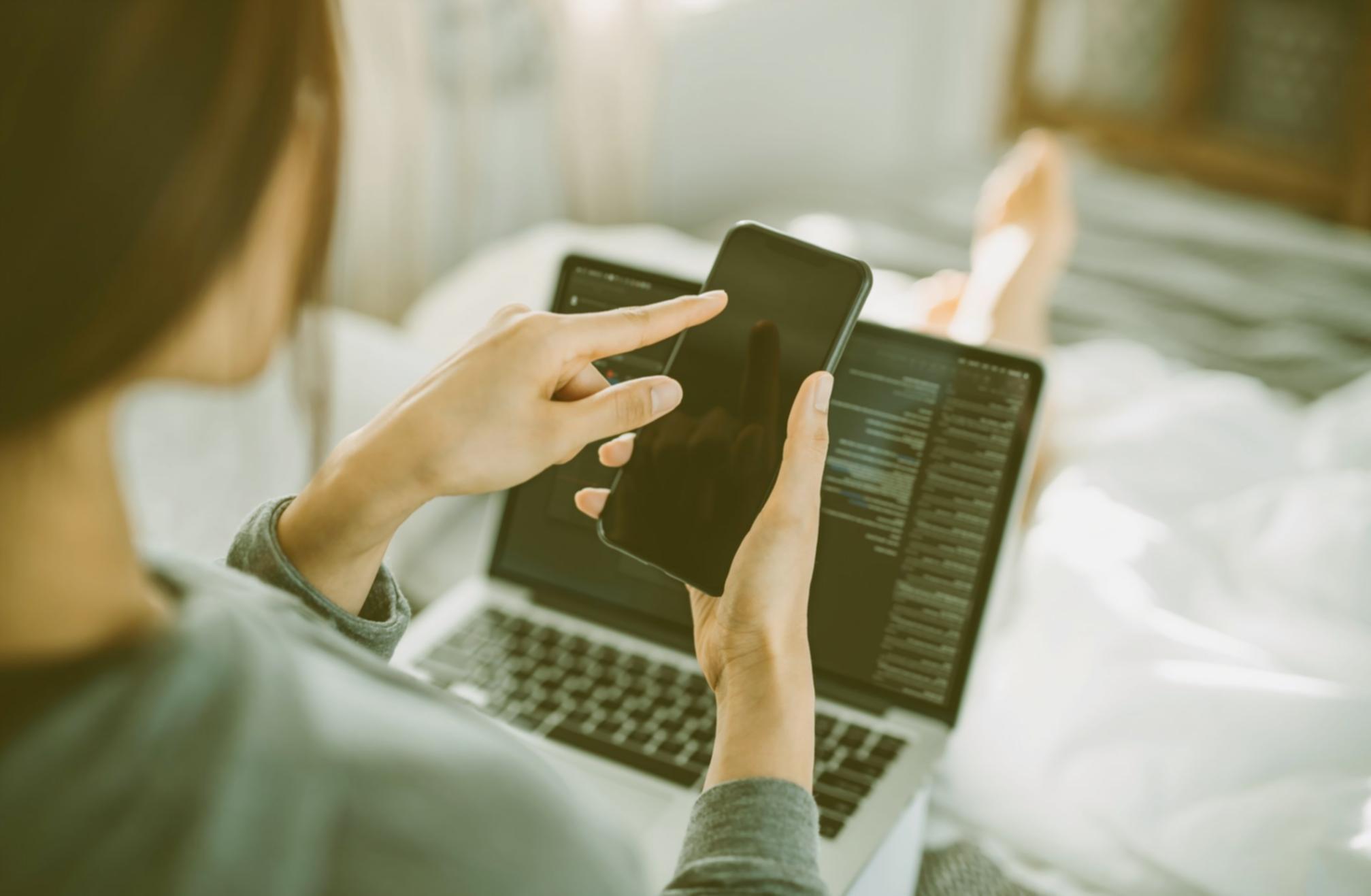 Workshop participant working through budget allocation exercise on laptop